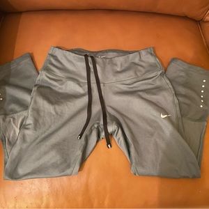 Nike sage green crop gym leggings with rear pocket